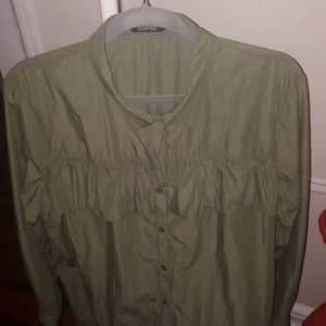 Ruffle button down shirt.